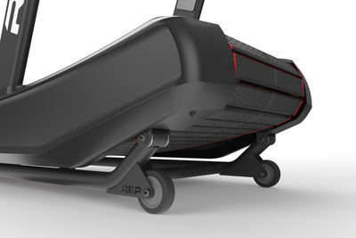Close up of underneath the back end of REP® Strive Series Curved Treadmill with wheels.